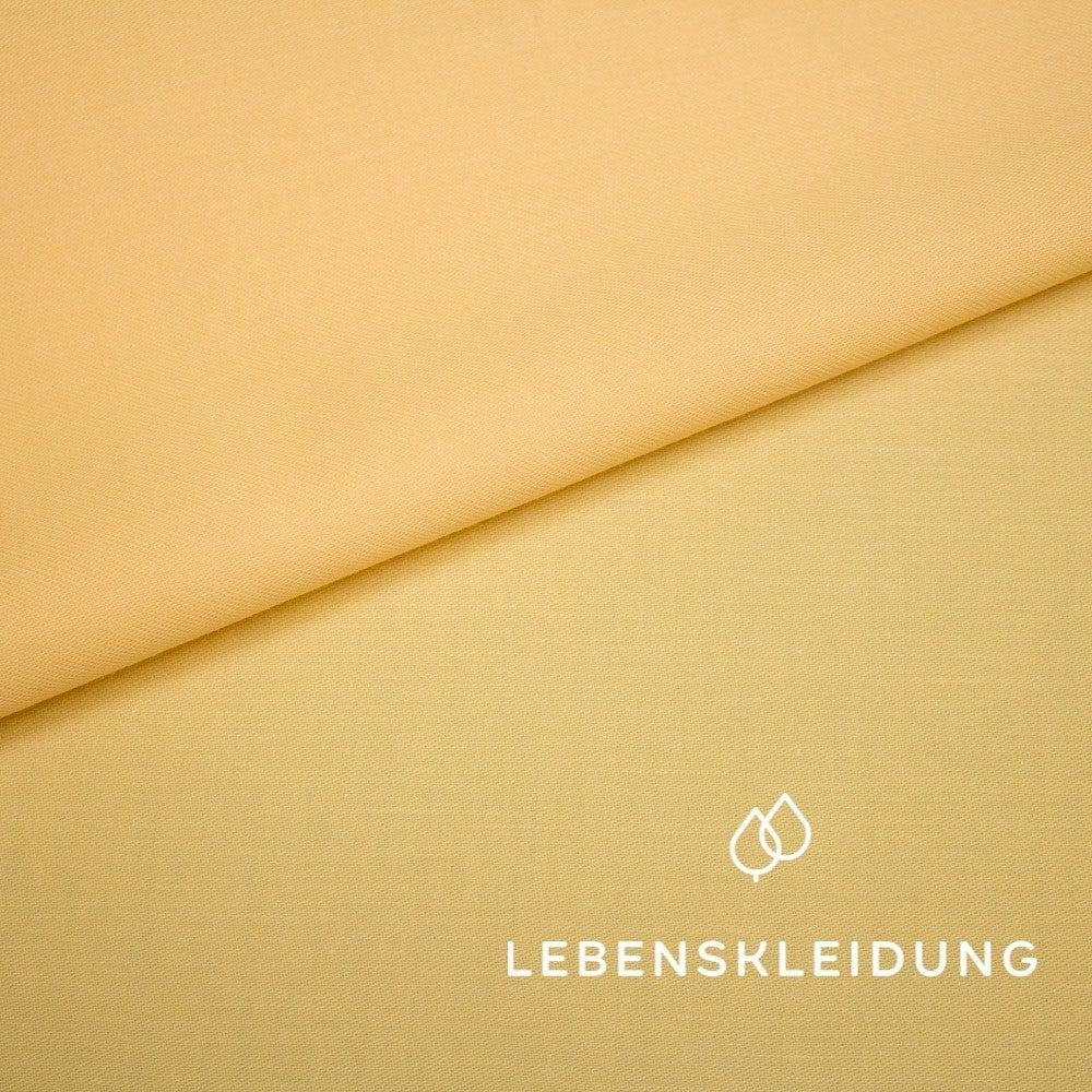 Satin biologique lisse - échantillon abricot – Gros plan