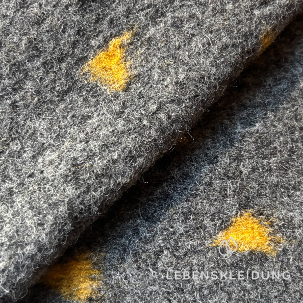 Re-Life Dotted Organic Wool Felt made from Organic Wool and Organic Cotton - Dark Grey Melange Triangle sample – Detail view