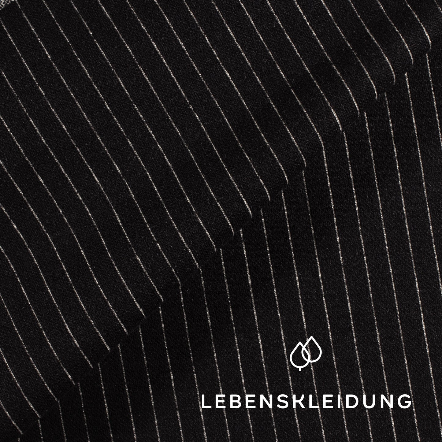 Bio Interlock Stoff - Schwarz Weiß Muster