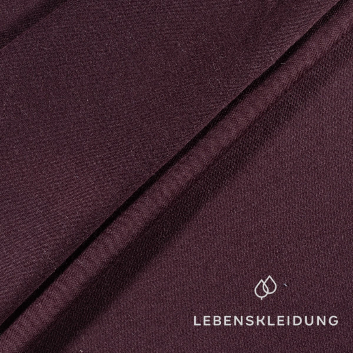 Tissu jersey extensible Re-Life - Raisin foncé – Texture du tissu