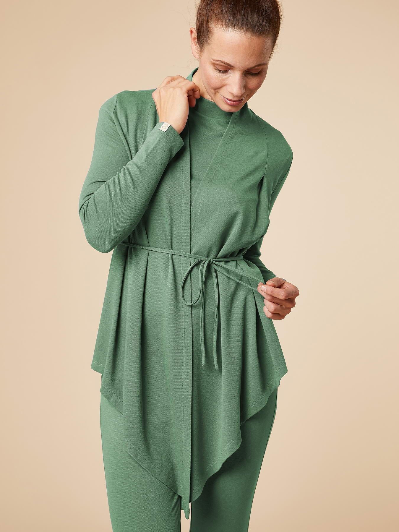 Re-Life Performance Interlock Stoff mit Ecovero Grün