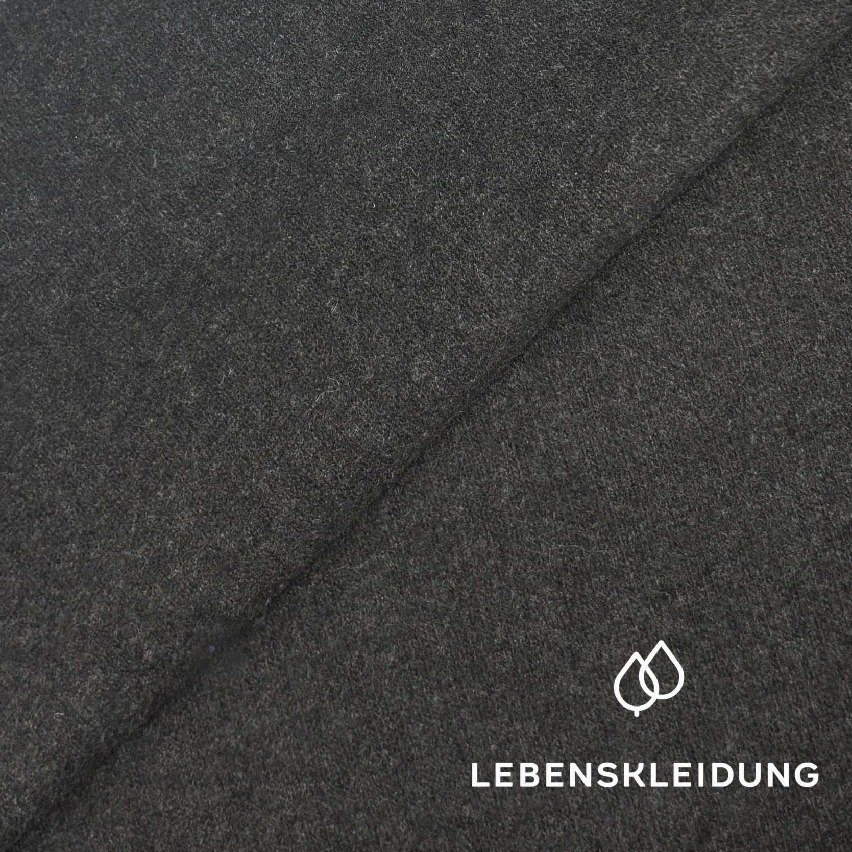 Re-Life Gebrushter Stretch Jersey mit recycelter Baumwolle und Polyacryl - Schwarz meliert - Bild 1