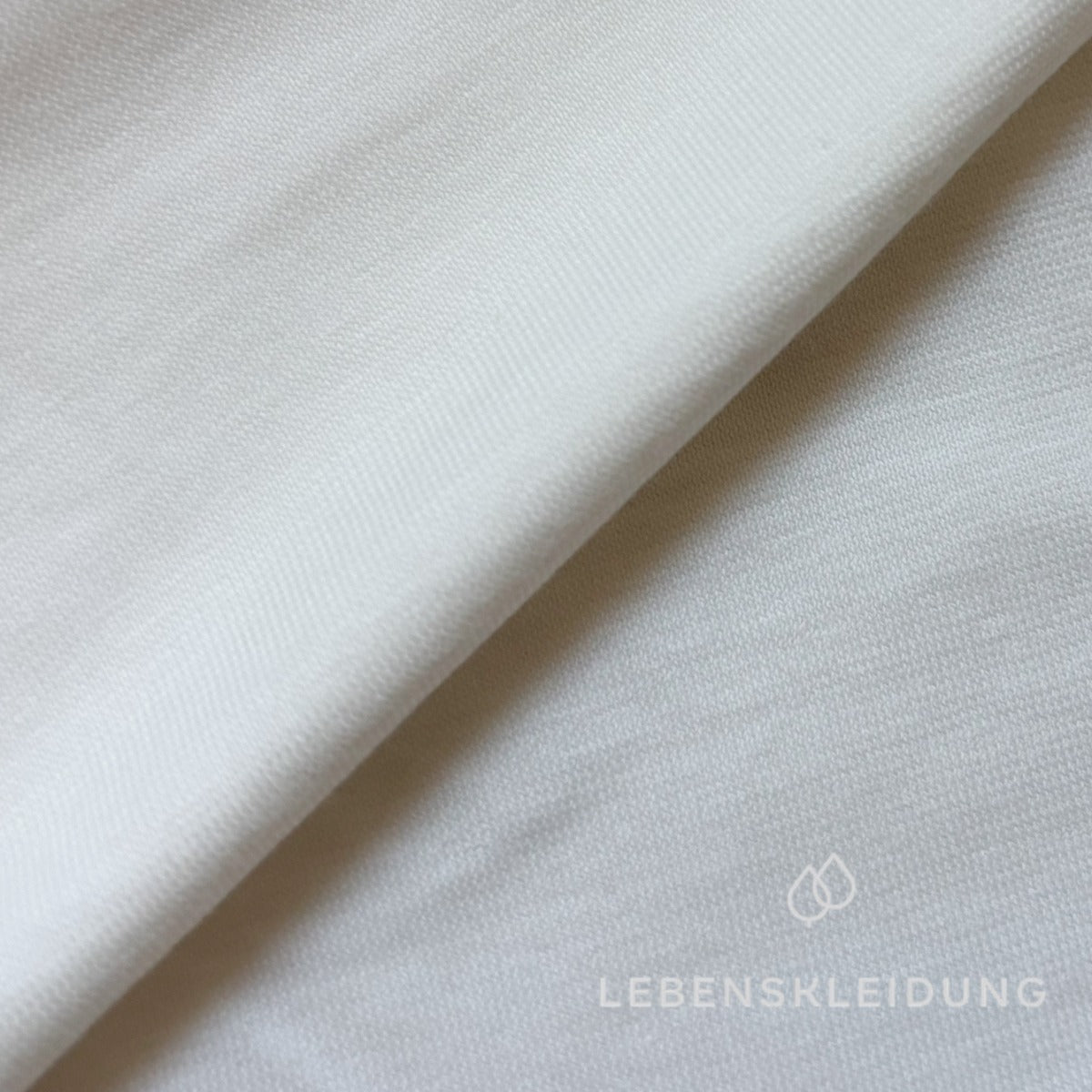 Tissu jersey simple en coton biologique - blanc sans azurants optiques, à motifs échantillon
