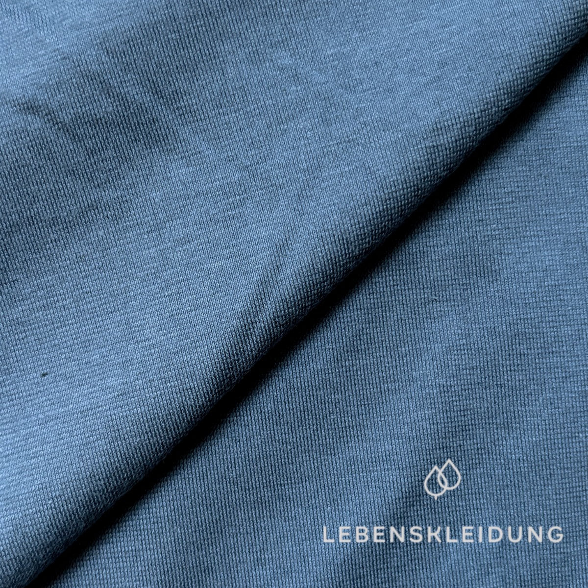 Bio Single Jersey Stoff - Steinblau Muster