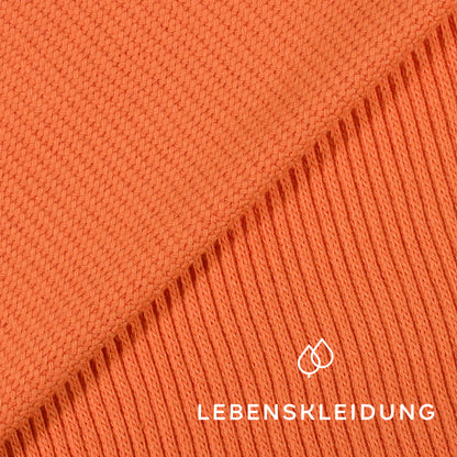 Tricot épais bio - Abricot Coucher de soleil – Gros plan