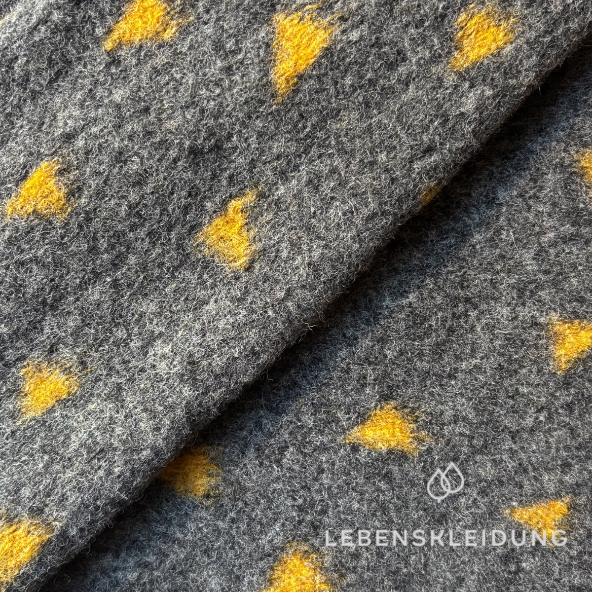 Re-Life Dotted Organic Wool Felt made from Organic Wool and Organic Cotton - Dark Grey Melange Triangle sample – Close-up