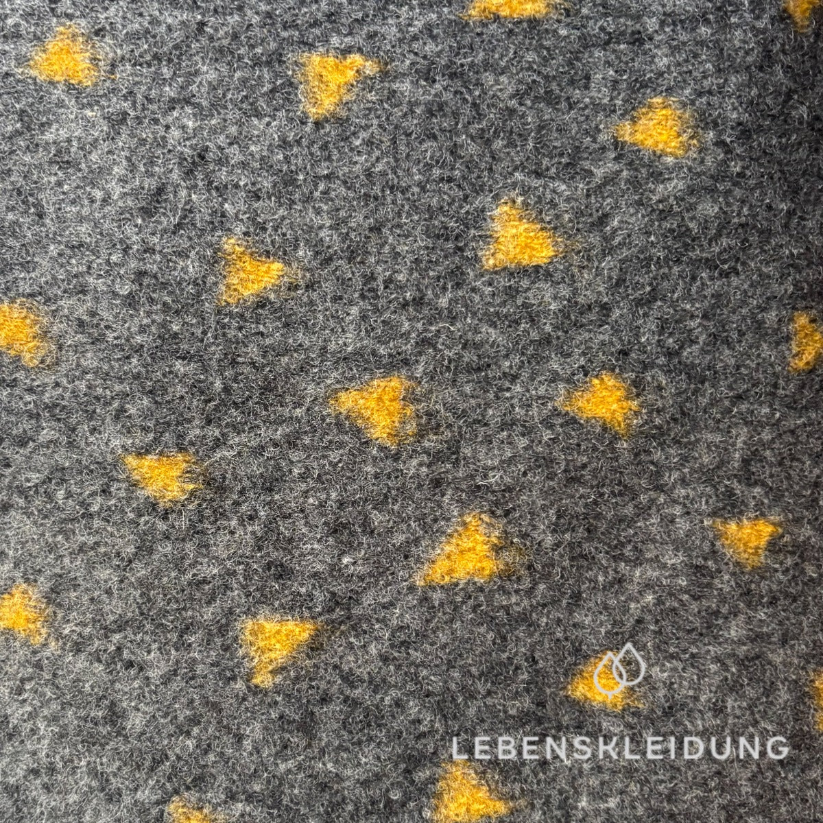 Re-Life Dotted Organic Wool Felt made from Organic Wool and Organic Cotton - Dark Grey Melange Triangle sample