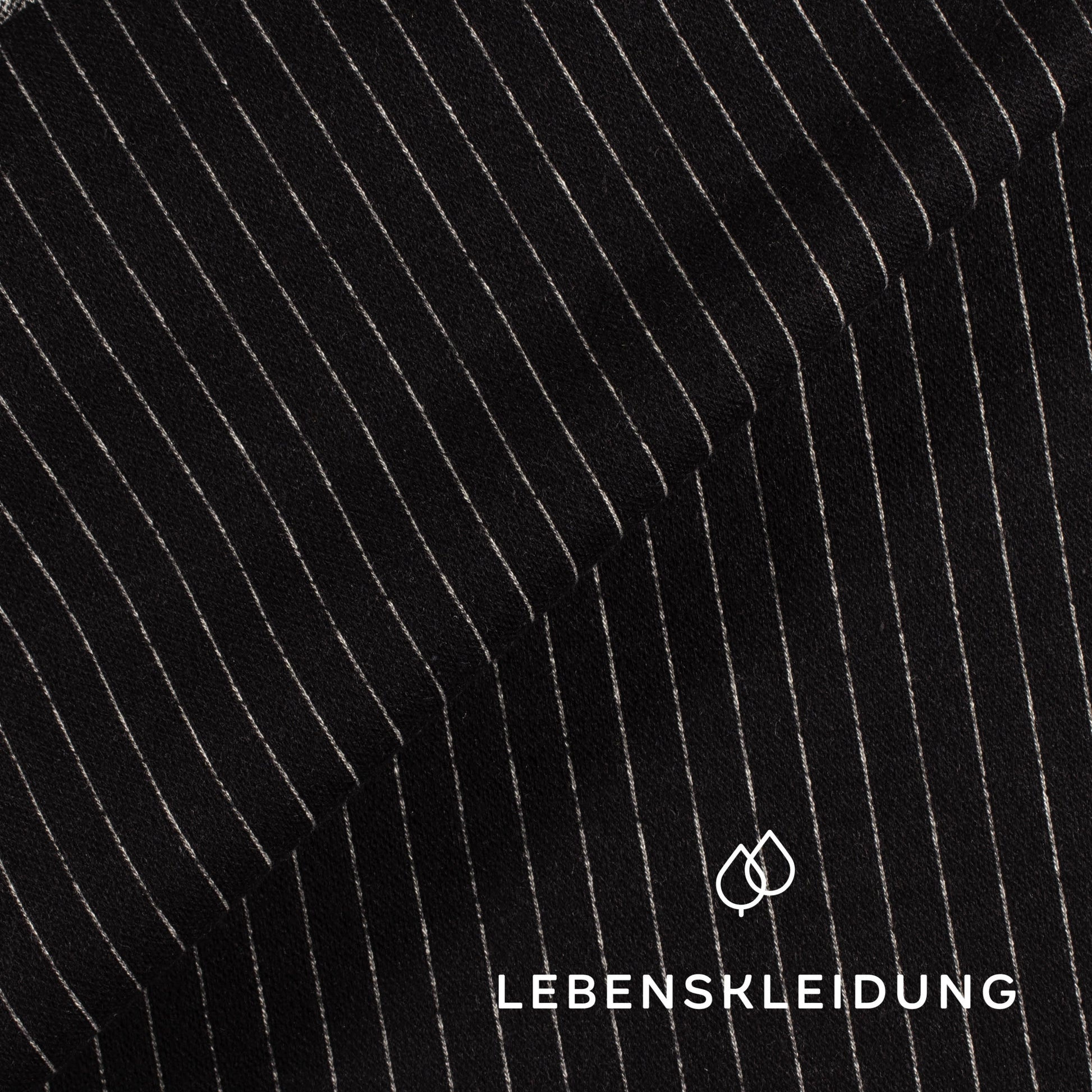 Bio Interlock Stoff - Schwarz Weiß Muster