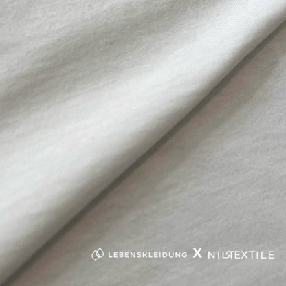 Re-Life NILCOTT® Jersey simple biologique écru 145 g/m² - Blanc cassé