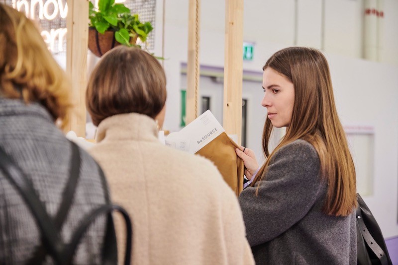 Munich Fabric Start visitor viewing fabrics 